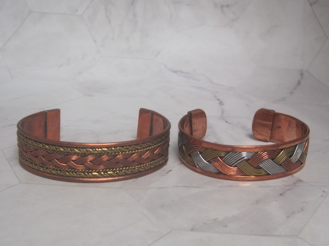 Lot of 2 Copper Cuff Bracelets: .