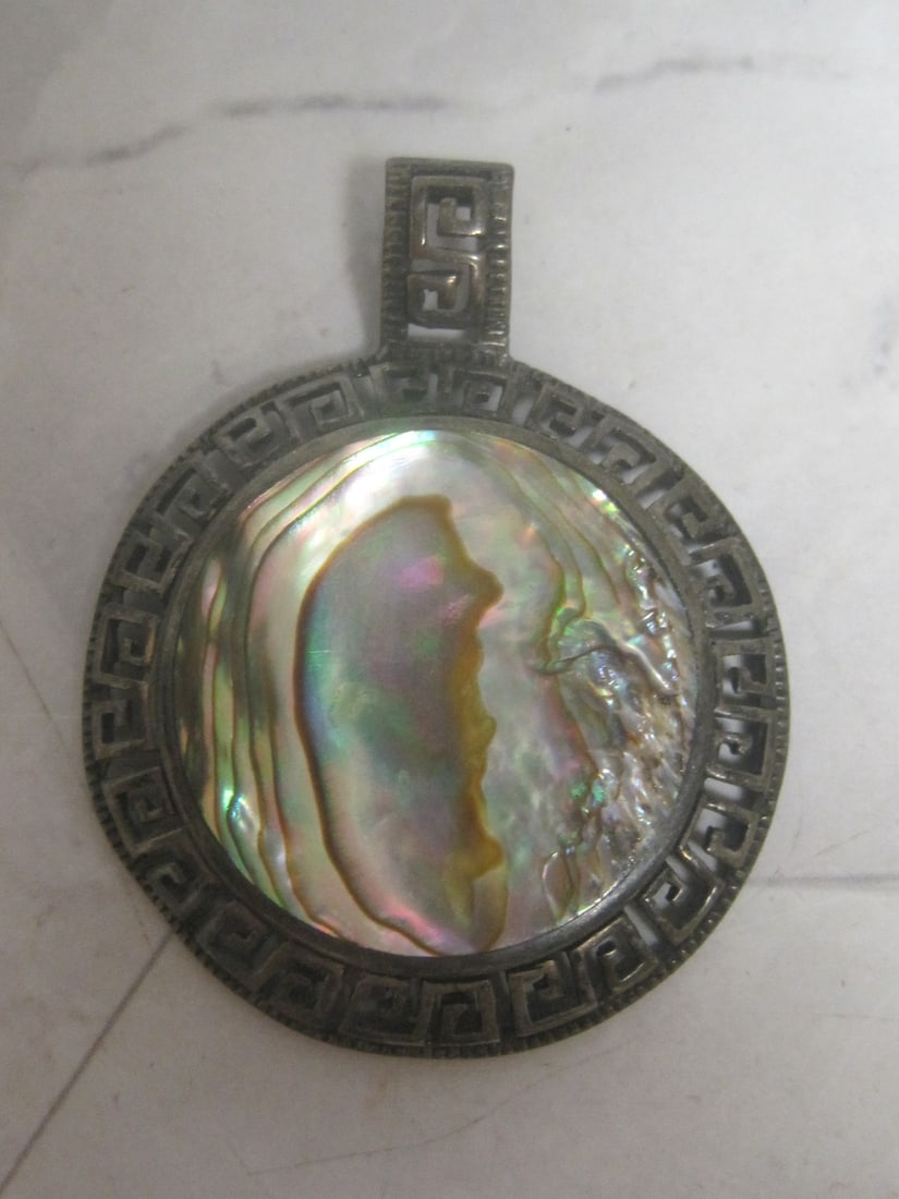 Sterling Silver Mother of Pearl Pendant: Weighs 7.1 grams