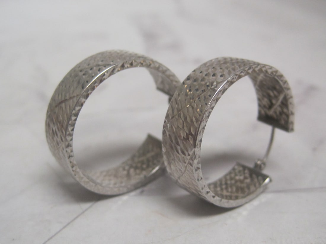 Sterling Silver Textured Hoop Earrings: Weighs 4.3 grams