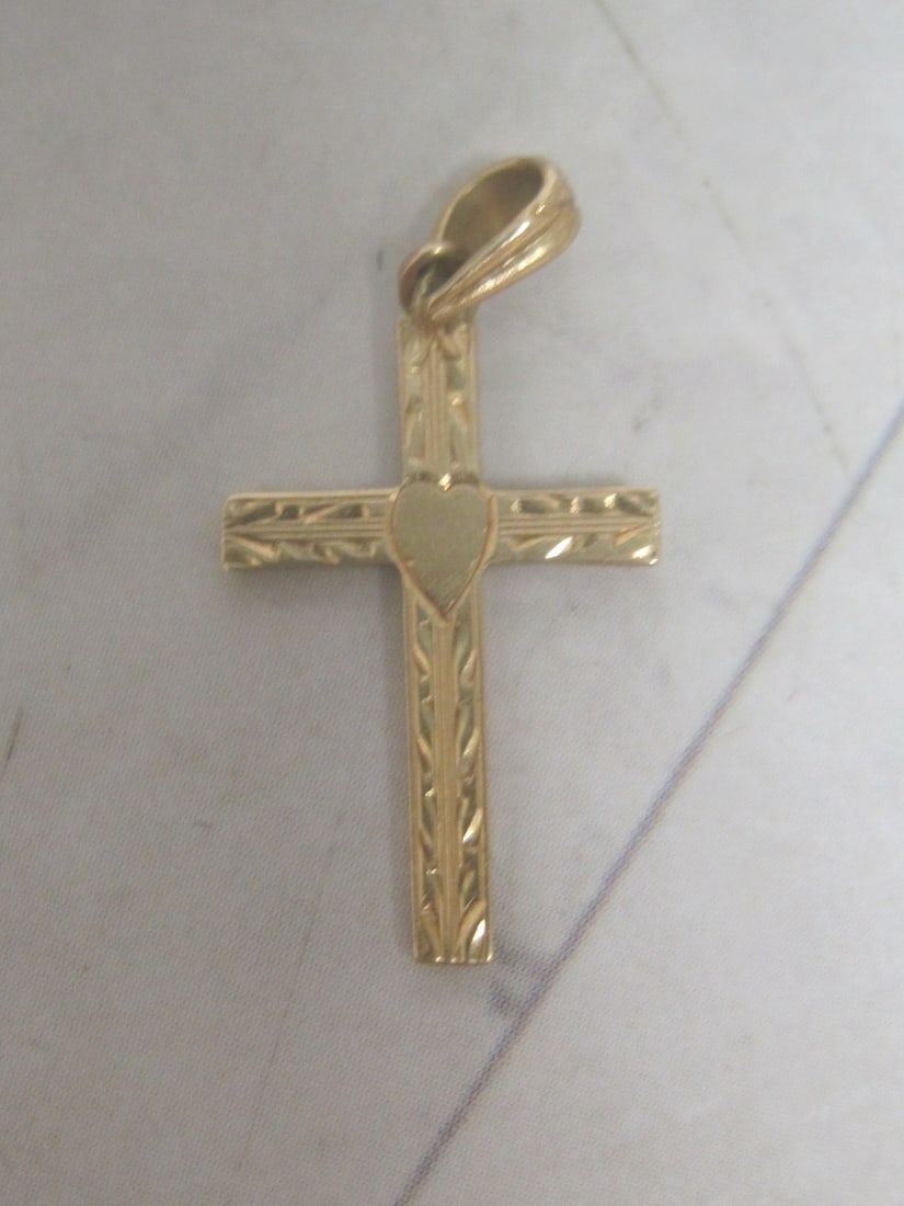 14k Gold Cross Pendant: Weighs 0.3 gram