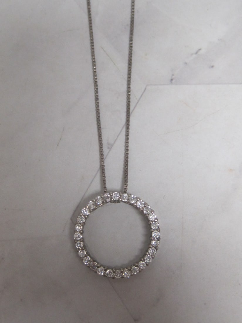 Sterling Silver CZ Circle of Life Pendant on 18" Sterling Silver Chain: Weighs 5.7 grams