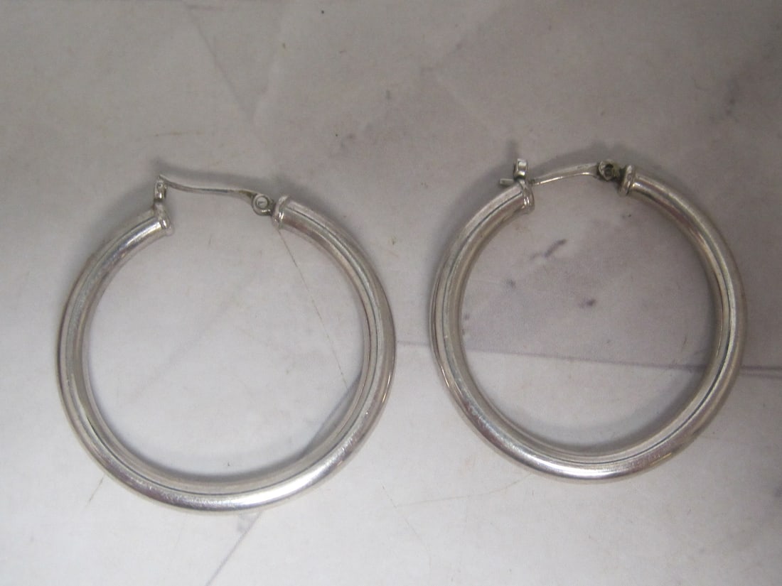 Sterling Silver Hoop Earrings: Weighs 3.5 grams