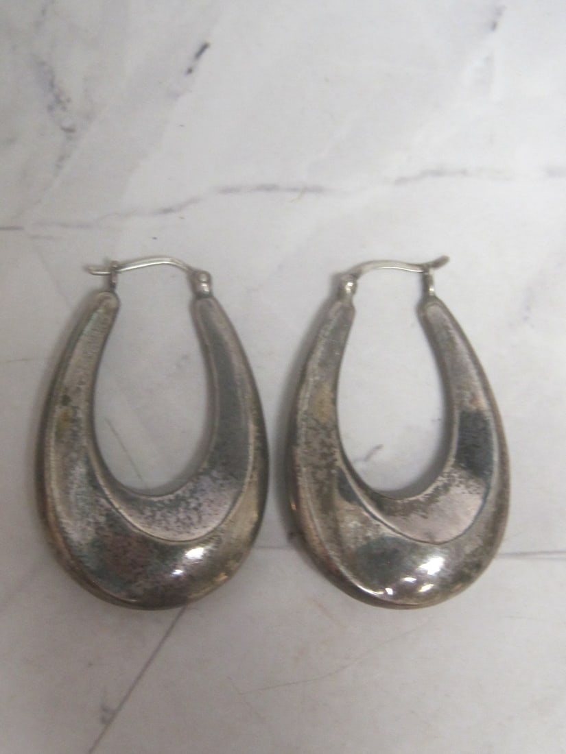 Sterling Silver Puffed Oblong Hoop Earrings: Weighs 4.5 grams