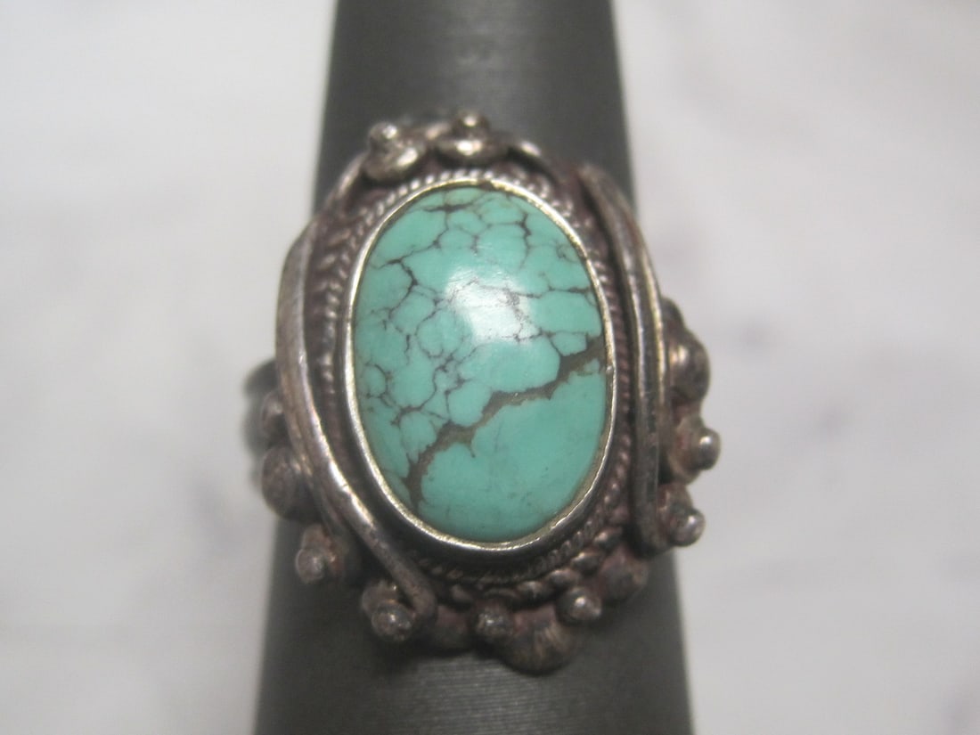 Sterling Silver Native American Style Turquoise Ring: Weighs 6.9 grams, Size 7