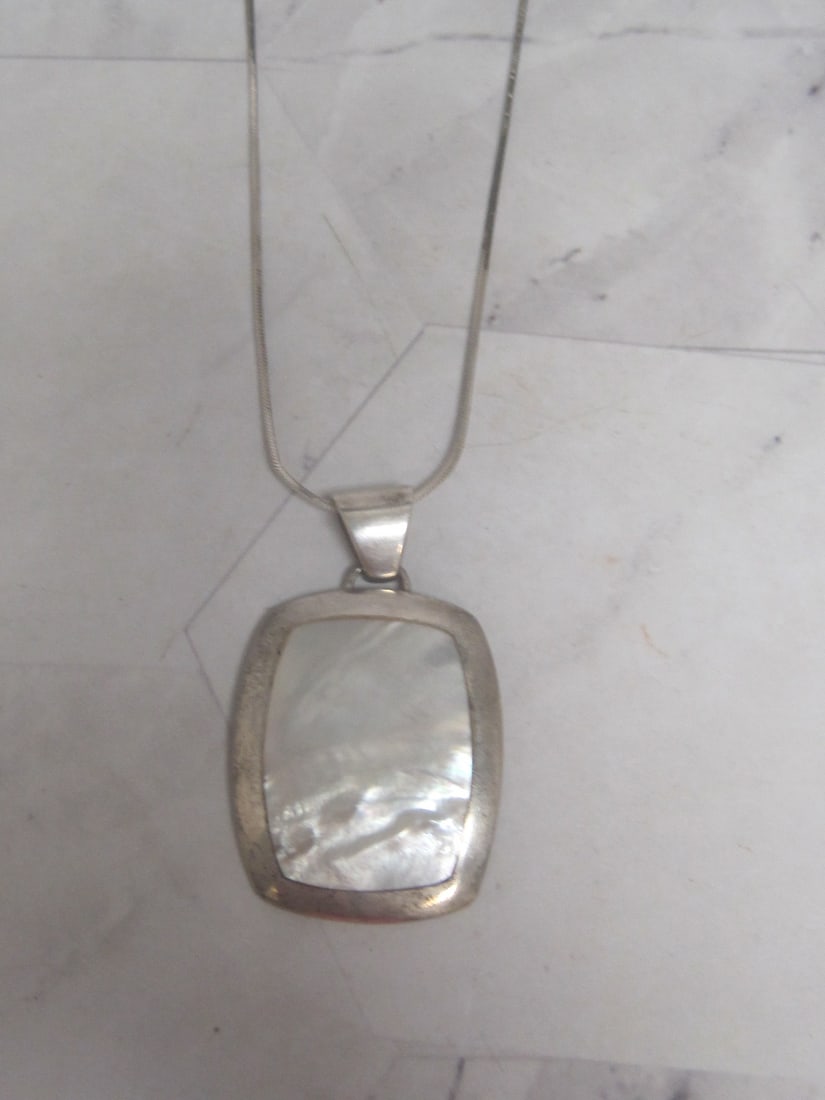 Sterling Silver Mother of Pearl Pendant on 18" Sterling Silver Chain: Weighs 10.5 grams