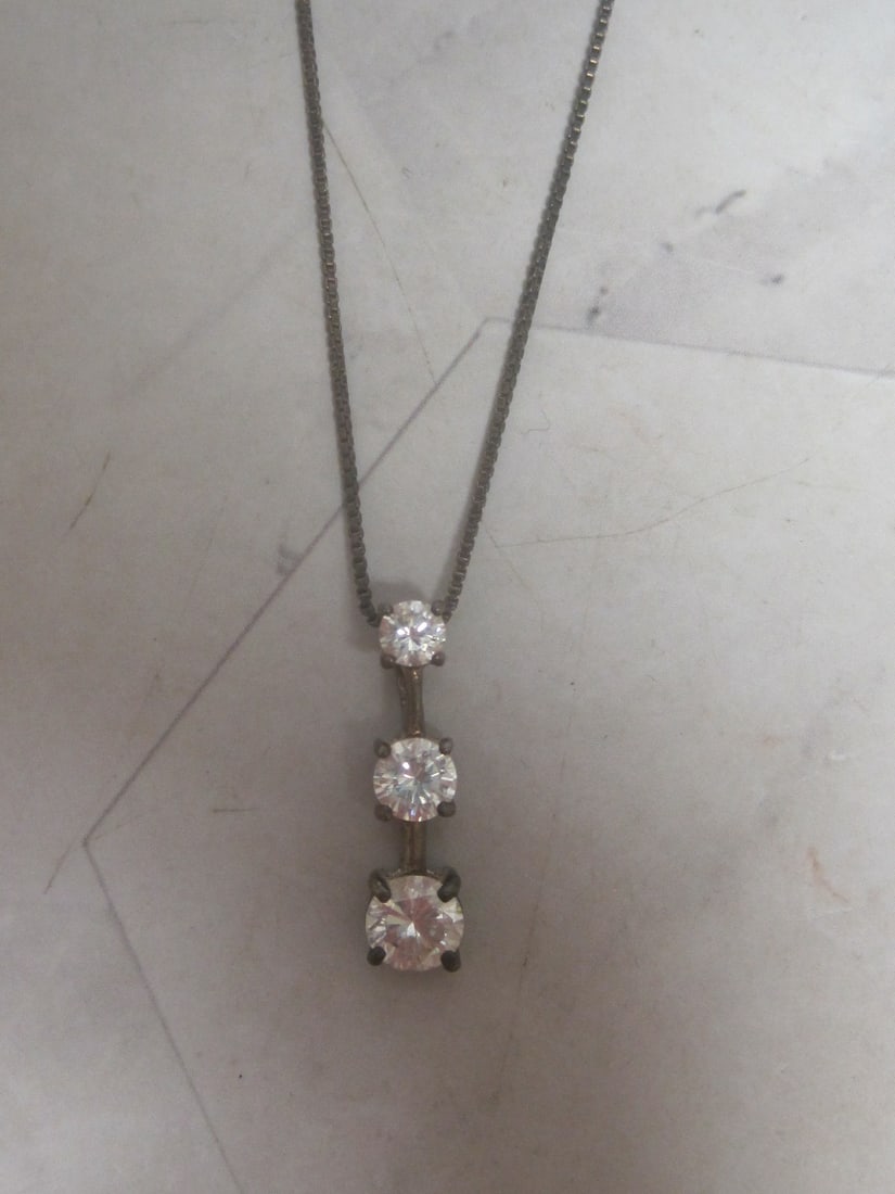 Sterling Silver CZ Pendant on 18" Sterling Silver Chain: Weighs 3.8 grams