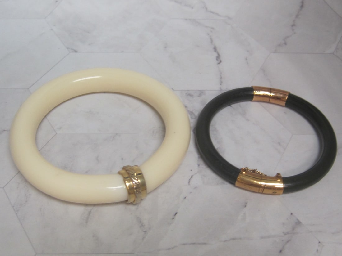 Lot of 2 Vintage Bangle Bracelets with Goldtone Accents: .