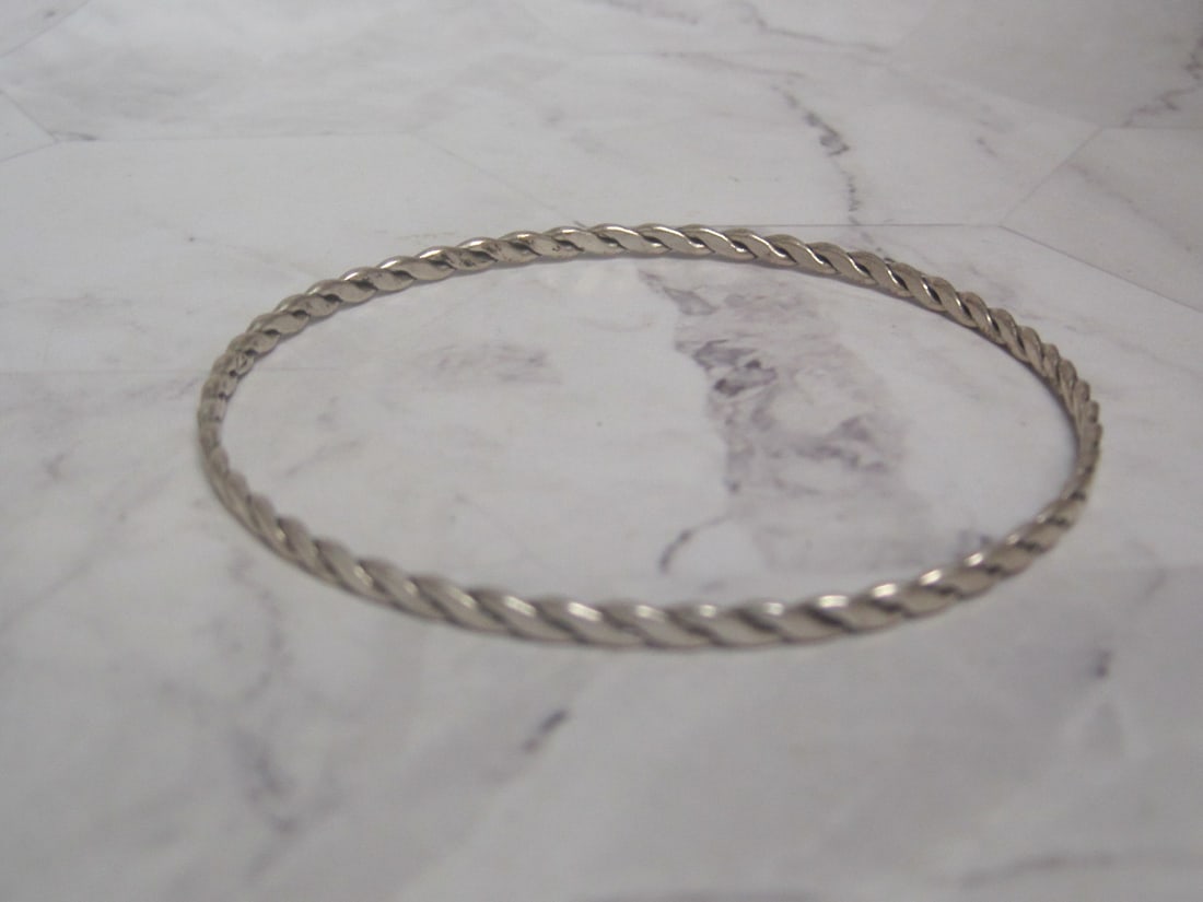 Sterling Silver Bangle Bracelet: Weighs 7.9 grams
