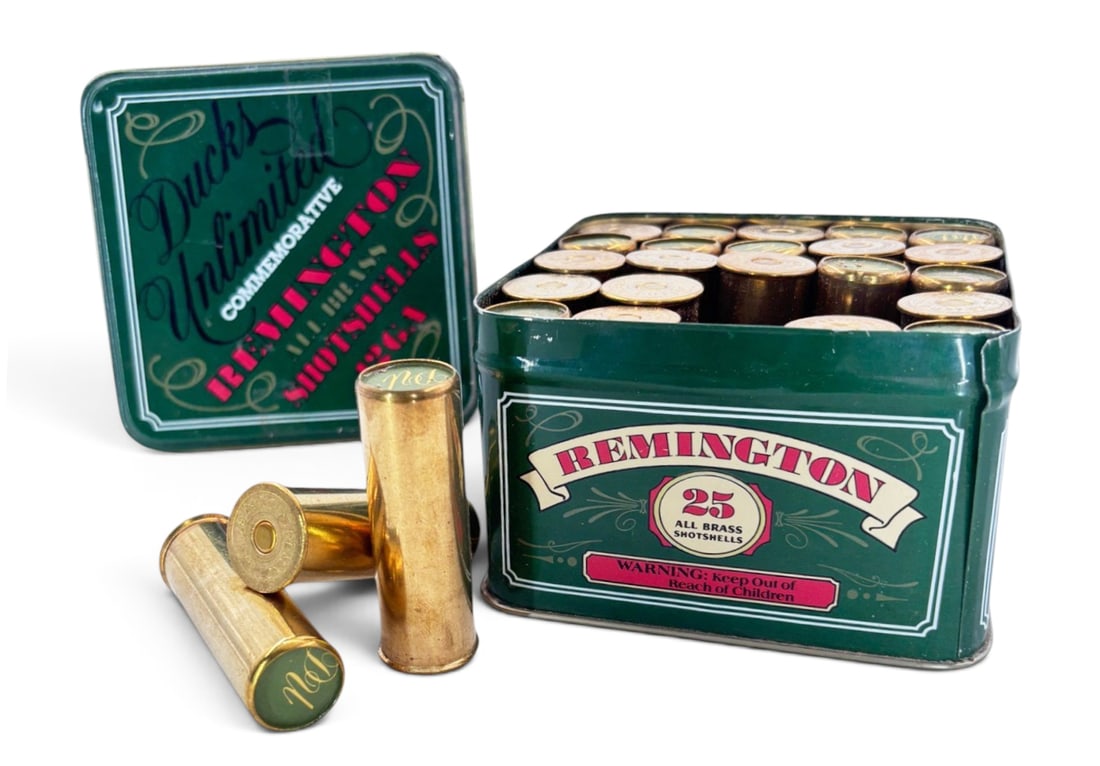 Collectible 25rds. of 12 GA. Remington Ducks Unlimited (DU) Brass Shotgun Shell Ammunition in Tin: This is an original Ducks Unlimited 50th Anniversary Tin, complete with 25 all brass shot shell, completely un-fired ammunition. | Head stamped "D. P. 37-87"