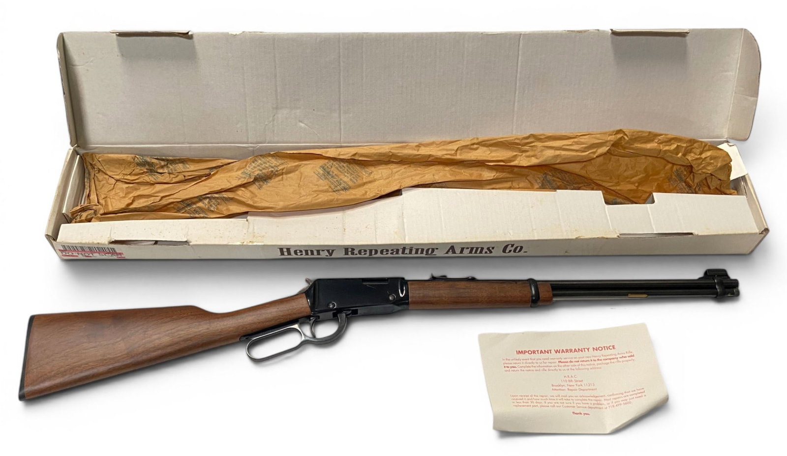 NIB Henry Repeating Arms Co. Model H001 .22 LR Lever Action Rifle: S#: 045186 | Model H001 | 18.5” Barrel with full length magazine tube | Comes in factory box with matching label. See photos |||| CONDITION: New in box with minor storage wear ||||| CLASS: