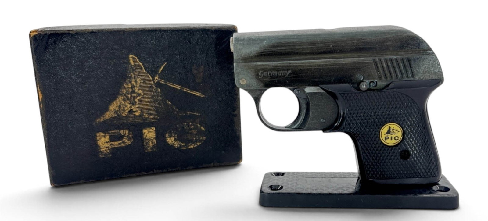 German PIC Model 6 (6mm) Starter Pistol in Original Box: This is a starter pistol that comes in its original box with instruction manual. It is missing the small magazine strip that inserts into the front of the pistol. Box is in good condition showing age