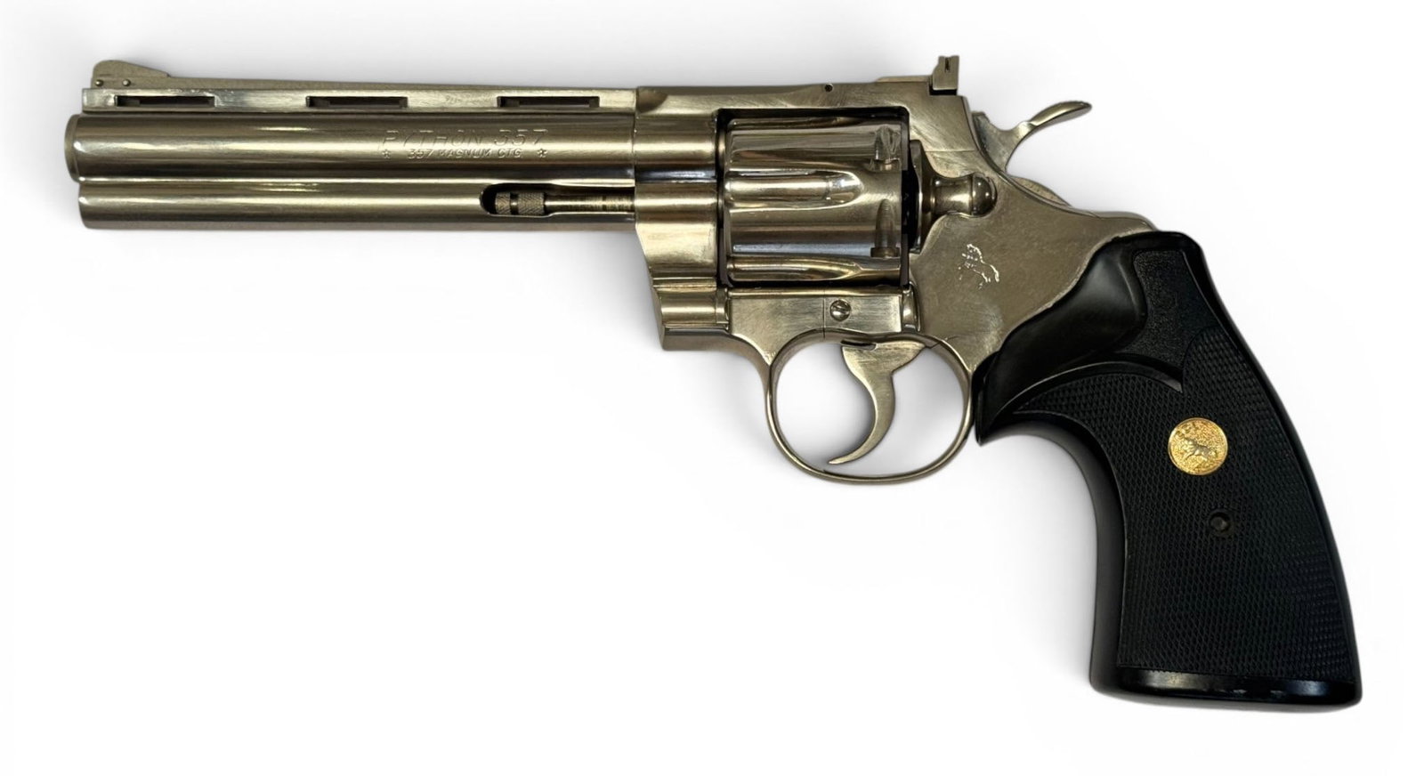 Excellent 1970 Colt Python 6" Nickel .357 MAGNUM Revolver: S#: E14059 | Mfg. 1970 | 6" Barrel | Factory Nickel finish | Black medallion presentation Pachmayr grips |||| CONDITION: Excellent. 100% original finish with some storage oxidation. Should clean up we
