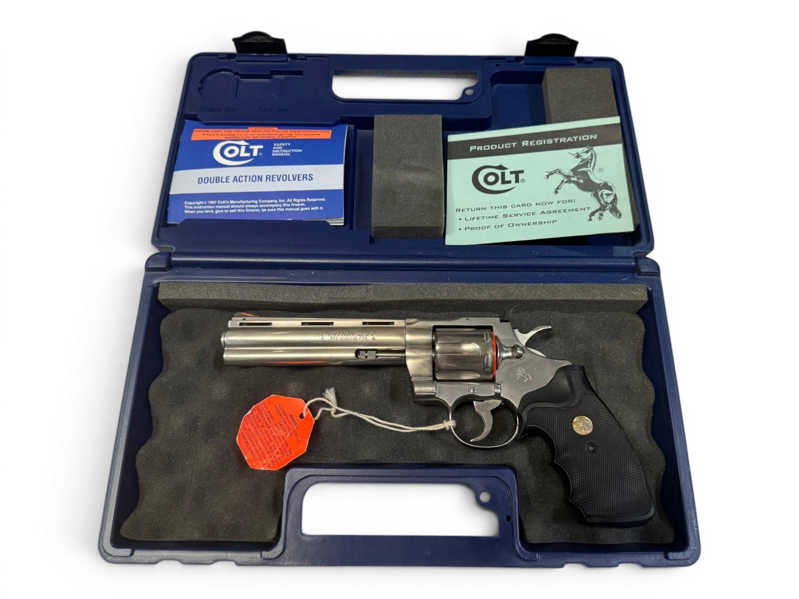 Excellent 1992 Colt Python 6" Stainless .357 MAGNUM Revolver: S#: KT884 | Mfg. 1992 | 6" Barrel | Factory Stainless finish | Black Colt medallion Pachmayr "Gripper" grips | Comes in a non-matching hard case |||| CONDITION: Excellent. Overall 98%, with minor