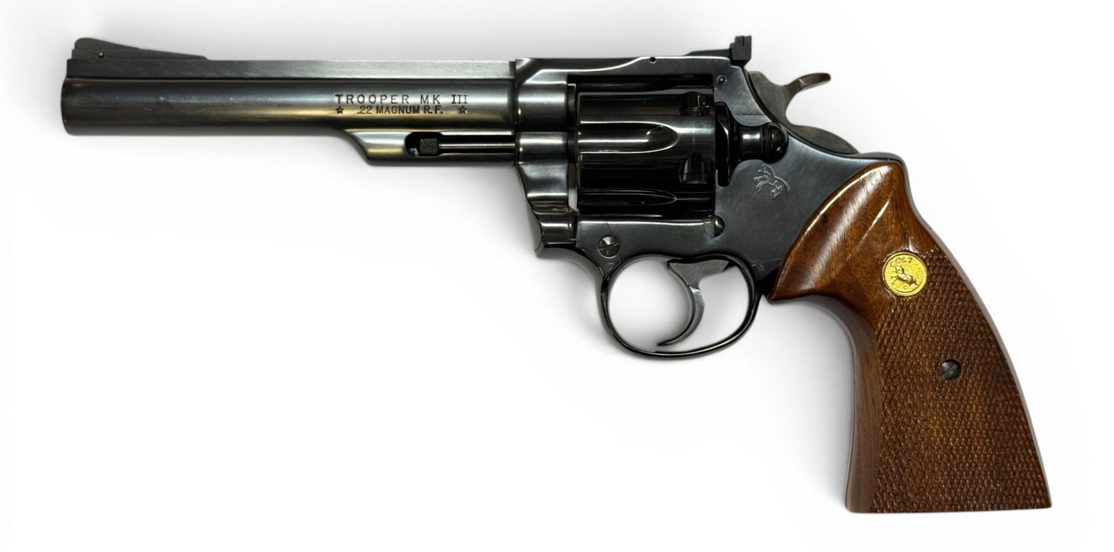 Excellent RARE 1979 Colt Trooper MK. III 6" Blued .22 MAGNUM RF Revolver: S#: Y7978 | Mfg. 1979 | 6" Barrel | Factory Blue finish | .22 MAGNUM RF |||| CONDITION: Excellent. 100% original finish. Minor storage scratches on end of barrel. Wood grips are excellent. Some minor 
