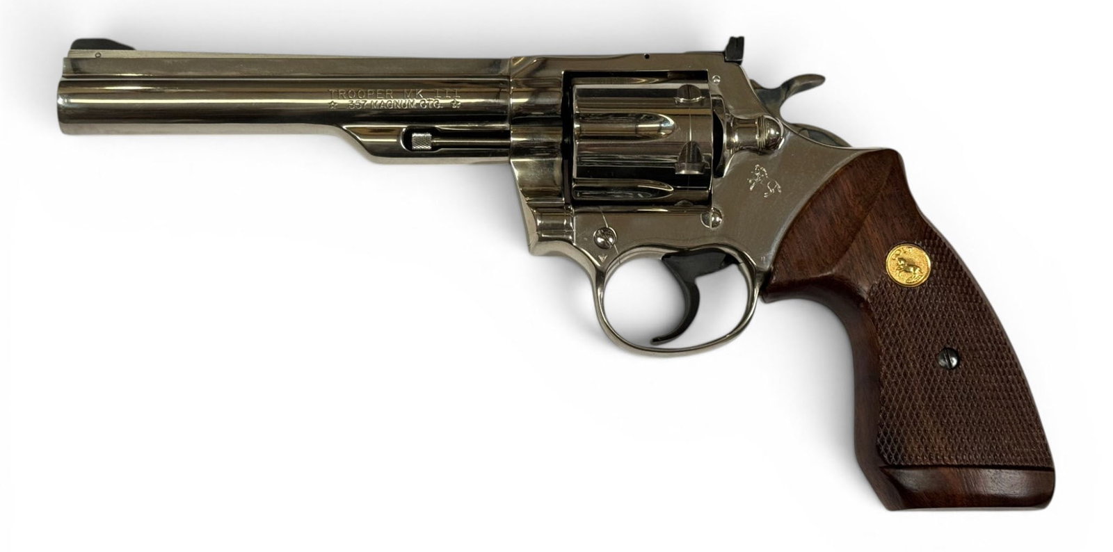 Excellent 1981 Colt Trooper MK. III 6" Nickel .357 MAGNUM Revolver: S#: 28377U | Mfg. 1981 | 6" Barrel | Factory Nickel finish |||| CONDITION: Excellent. 100% original finish. Mechanically functions. Bore is excellent. Grips may be replacement, do research. Very minor
