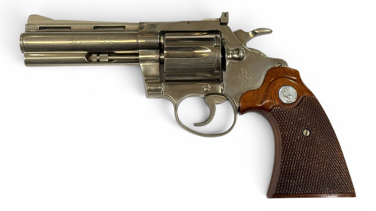 Excellent RARE 1971 Colt Diamondback 4" Nickel .38 SPECIAL Revolver: S#: D47153 | Mfg. 1971 | 4" Barrel | Factory Nickel finish | Diamondback | .38 SPECIAL |||| CONDITION: Excellent. 100% original finish with minor oxidation. Mechanically functions. Bore is excellent. 