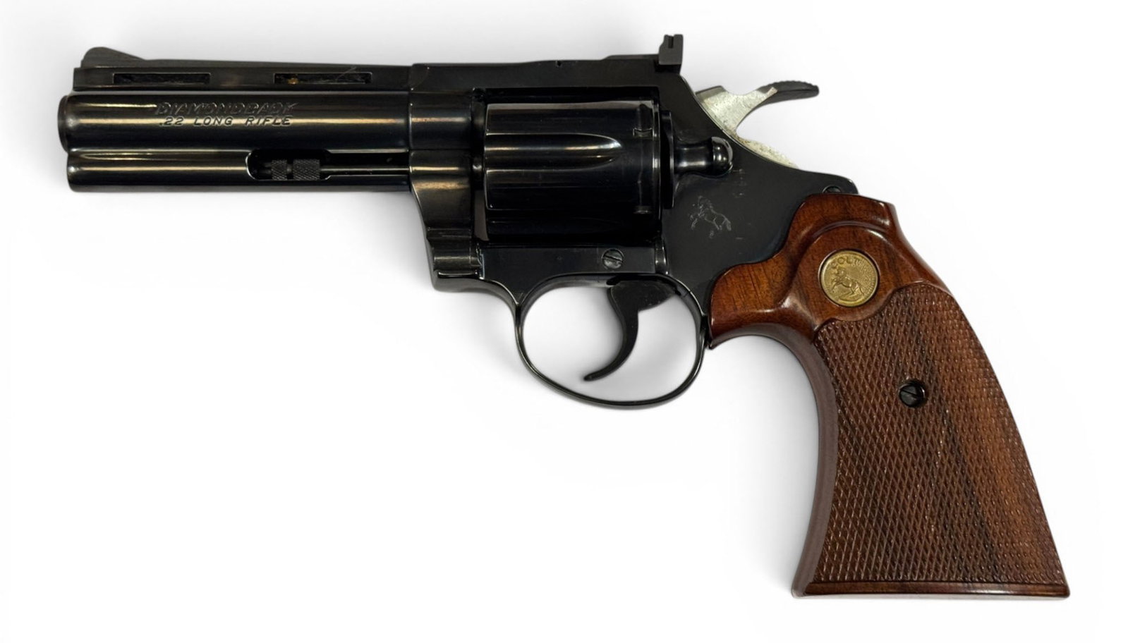 Excellent 1978 Colt Diamondback 4" Blued .22 LR Revolver: S#: R30475 | Mfg. 1978 | 4" Barrel | Factory Blue finish | Diamondback | .22 LR |||| CONDITION: Excellent. 98% original blue finish with minor touch up on muzzle tip. Very faint, almost non-existent