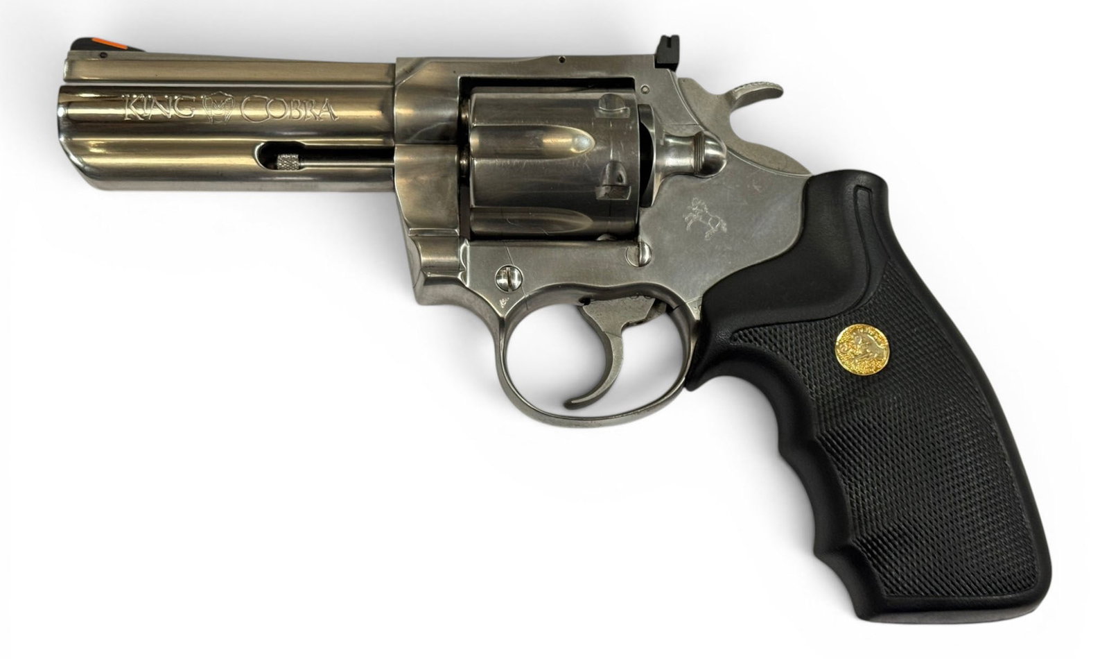 Excellent 1997 Colt King Cobra 4" Polished Stainless .357 MAGNUM Revolver: S#: KV9652 | Mfg. 1997 | 4" Barrel | Factory Polished stainless steel finish | King Cobra .357 MAGNUM | Equipped with factory black rubber medallion grips |||| CONDITION: Excellent. 99% overall with s