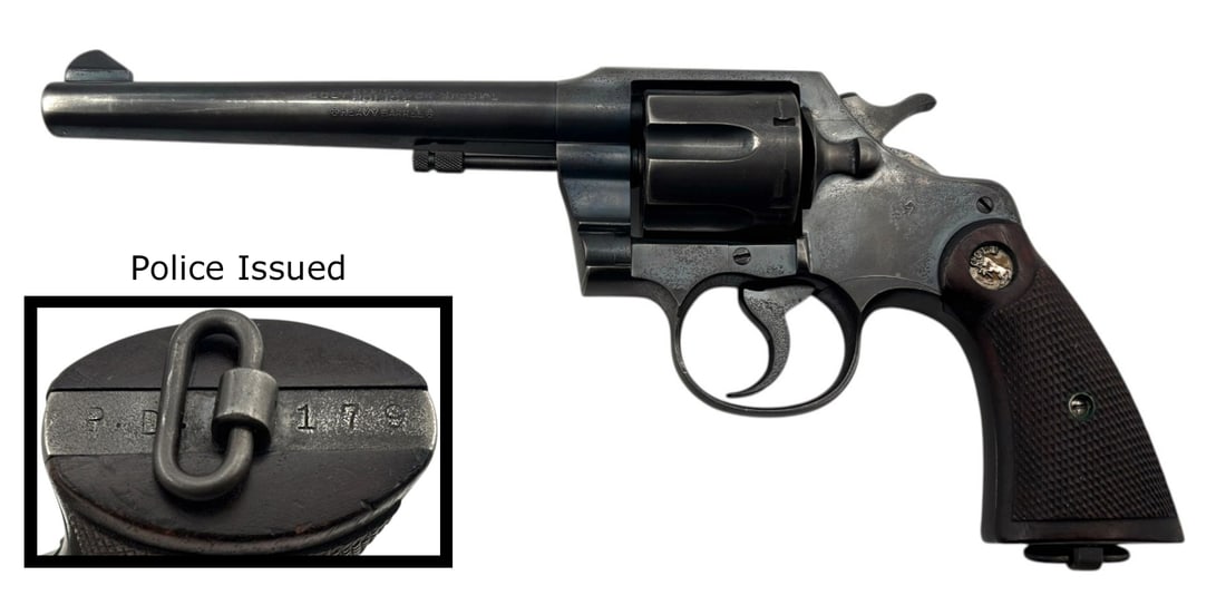 1947 Colt Official Police Heavy Barrel .38 SPL Revolver Police Issued with Landyard Loop: S#: 732616 | 6" Heavy Barrel | 6 Shot SA/DA Revolver | "PD" Stamped on the butt, along with the Officers Shield Number "179" |||| CONDITION: Very Good, with Service Wear. Retaining 90% Original Blued 
