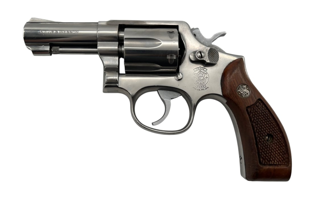 Excellent Early 1993 Smith & Wesson Model 64-5 Polished Stainless .38 SPECIAL Revolver &#: S#: BKB6152, mfg. 1993 | 3" Barrel | 6-Shot SA/DA | Initials scratched into trigger guard |||| CONDITION: Very Good with a nice stainless finish with minor dings and scratches. Handling marks on botto
