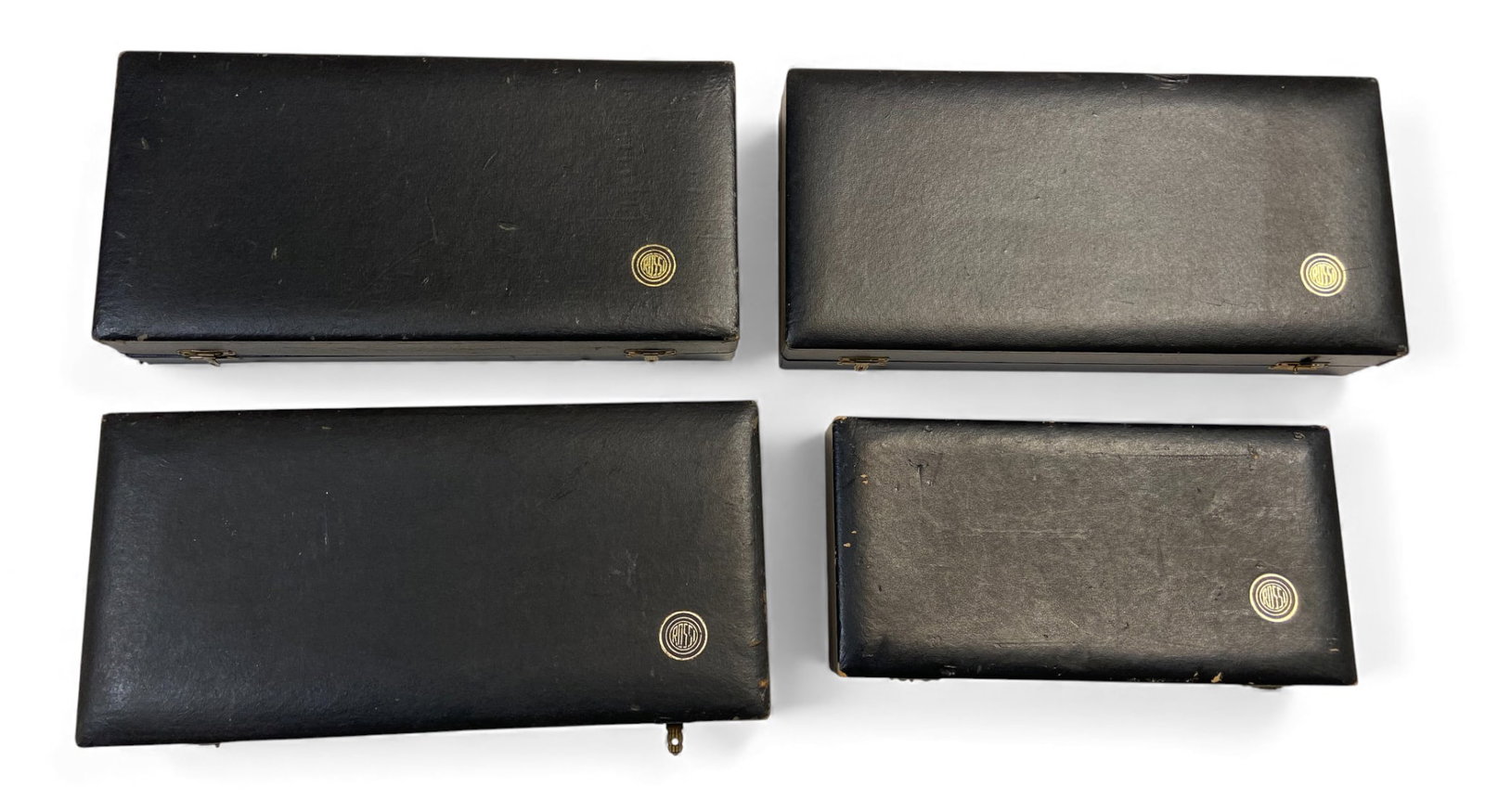 (4) Vintage Factory Rossi Presentation Cases: Nice fold open black hard cases with burgundy soft interior. These were issued from the Rossi Factory and are all in good condition for the most part. See photos for exact details, and condition.
