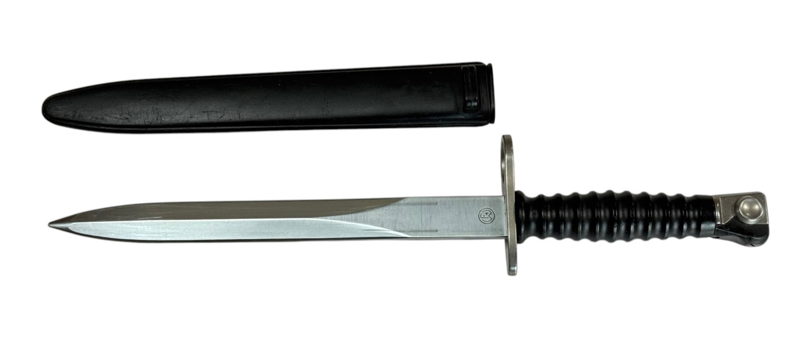 Swiss Military SIG M57 Bayonet with Scabbard by Victorinox: Knife bayonet for use on the renowned 7.5 mm Sturmgewehr 57 (STGW-57) made by SIG. Blade measures approximately. 9.5” and overall length measures 14.5”.
