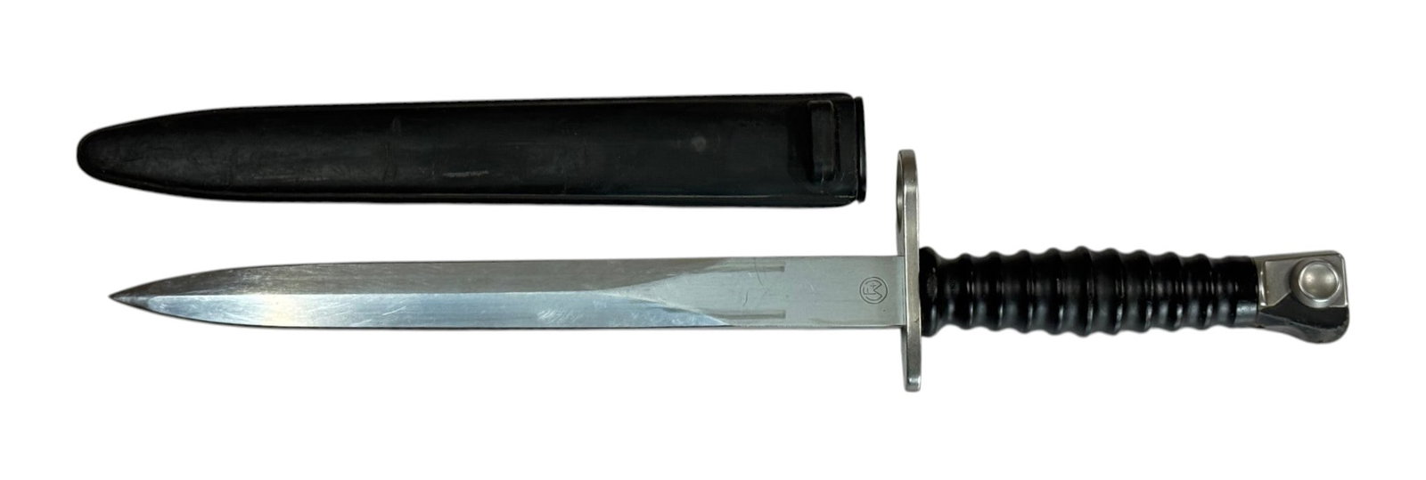 Swiss Military SIG M57 Bayonet with Scabbard by Wenger: Knife bayonet for use on the renowned 7.5 mm Sturmgewehr 57 (STGW-57) made by SIG. Blade measures approximately. 9.5” and overall length measures 14.5”.