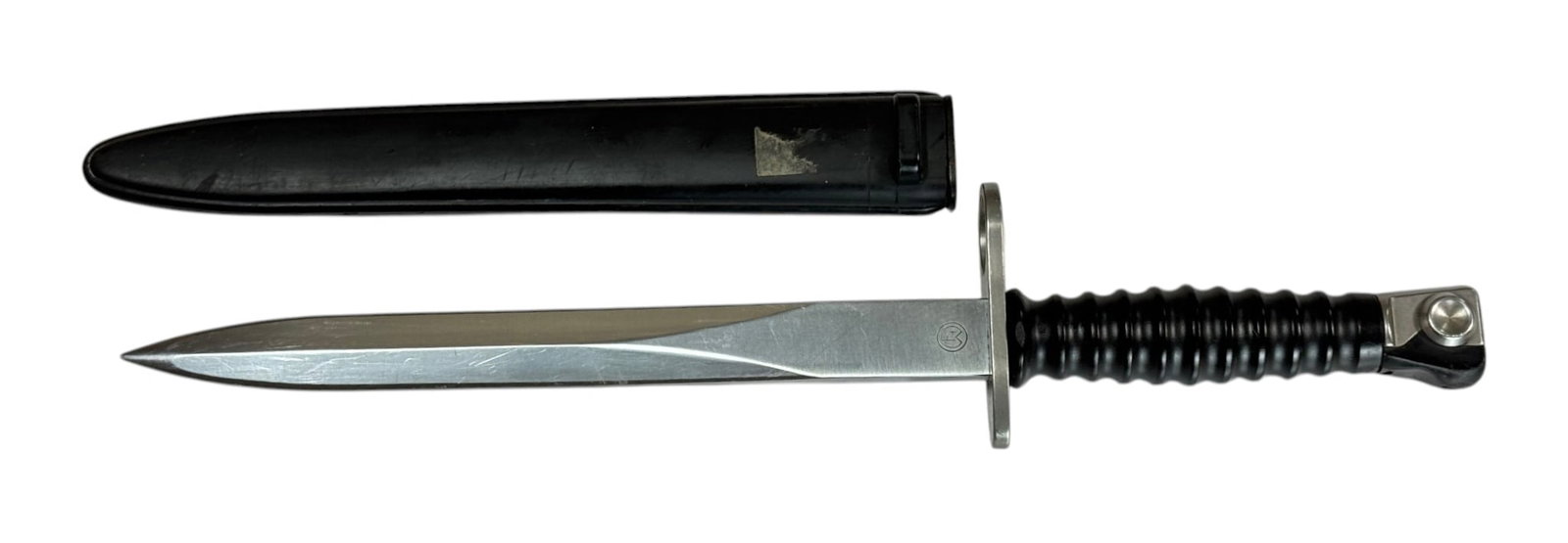 Swiss Military SIG M57 Bayonet with Scabbard by Victorinox: Knife bayonet for use on the renowned 7.5 mm Sturmgewehr 57 (STGW-57) made by SIG. Blade measures approximately. 9.5” and overall length measures 14.5”.