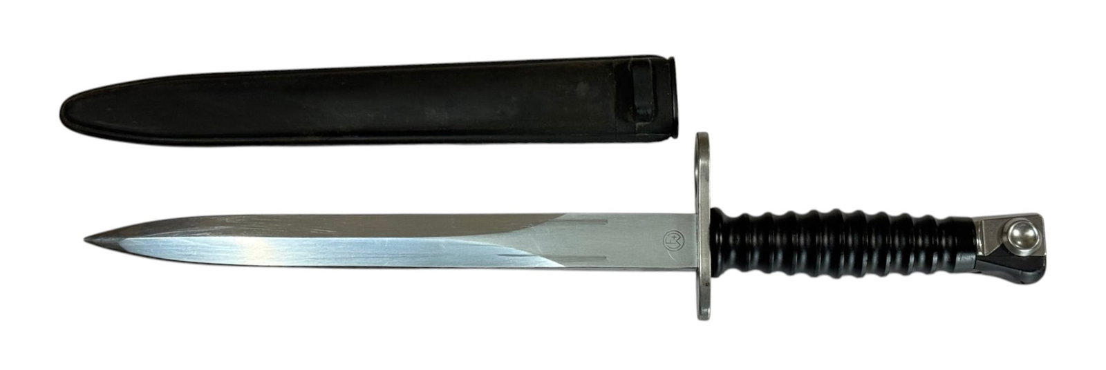 Swiss Military SIG M57 Bayonet with Scabbard by Wenger: Knife bayonet for use on the renowned 7.5 mm Sturmgewehr 57 (STGW-57) made by SIG. Blade measures approximately. 9.5” and overall length measures 14.5”.