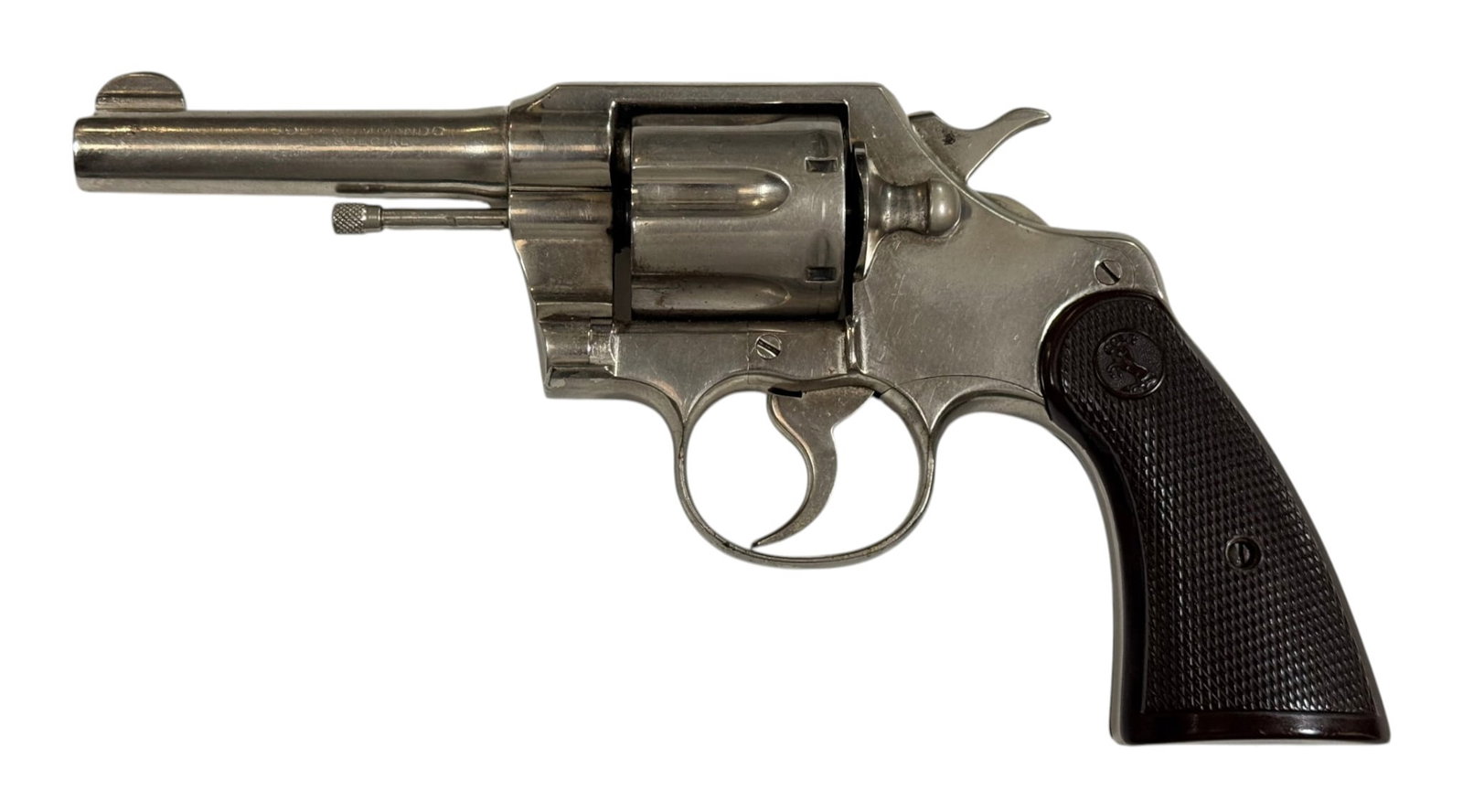 WWII 1943 US Colt Commando .38 SPECIAL Nickel Plated 4" Revolver: S#: 16679 matching on frame arm and cylinder crane | Mfg. in 1943 | 4" Barrel | Plastic Grips with Mold numbers inside each one 2 and 9 | Flaming bomb stamp top right, right side of frame | X and L