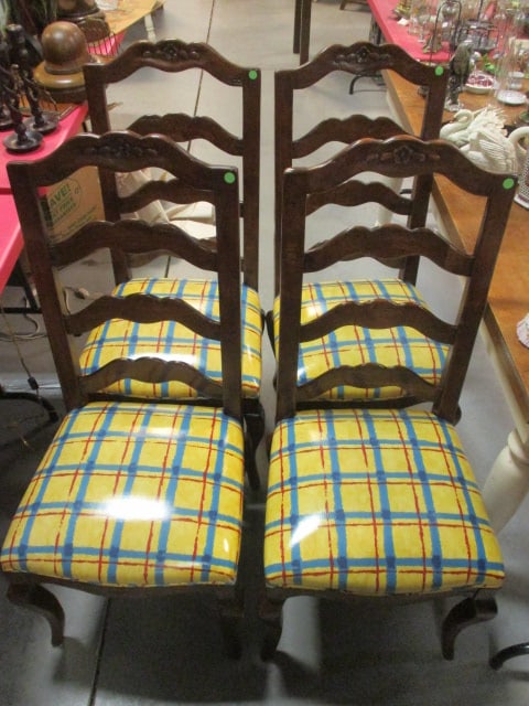 Four French Cottage Style Carved Ladder Back Side Chairs: 20 1/4"w Side chairs, Seats have vinyl coated brightly upholstered seats, Local Pickup Only