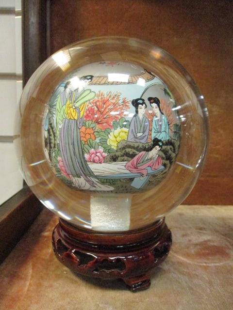Vintage Reverse Painted Chinese Glass Buddha Ball with Traditional Geisha Gathering: on Wood Display Stand. 6 1/4"h overall with stand, Ball 4 3/4"dia