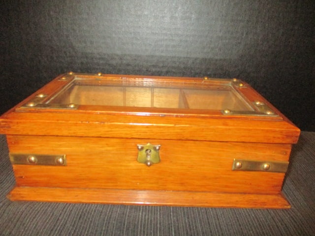 Antique Oak Beveled Glass Top Humidor with Brass Strap Accents: 11 1/2" x 7" x 4", locks but does not have key, felt covered bottom