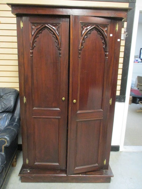 Spanish/Moorish Gothic Influence Computer Desk Cabinet: 43 1/4" x 26" x 73", interior has pullout keyboard, pullout printer shelf, drawer and open shelves. Back panel has hole for cables, left door has split in upper panel, Local Pickup Only