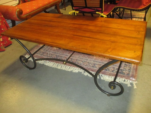 Scrolled Wrought Iron Distressed Pegged Plank Wood Top Coffee Table with Brass Accents: 54" x 27 1/4" x 20 1/2", some scuffs, Heavy!! Local Pickup Only