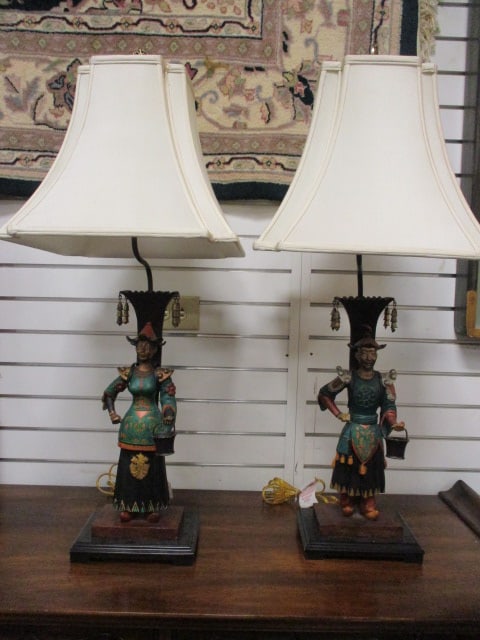 Pair of Chinoiserie Figural Male and Female Court Attendant Polychrome Figures: In Handpainted Traditional Style Costumes with Hanging Bells Holding Pails. Pierced Leaf Form Brass Finials with Fabric Shades. 35 1/2"h, Heavy!! Local Pickup Only