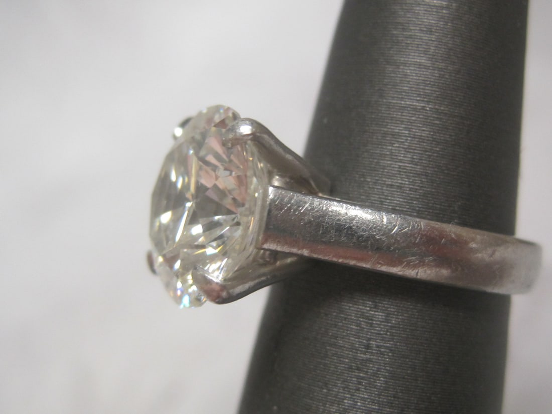 Platinum 5.85 Carat Round Brilliant Cut Diamond Ring appraised at $52,622.00 (25 years ago) - 2