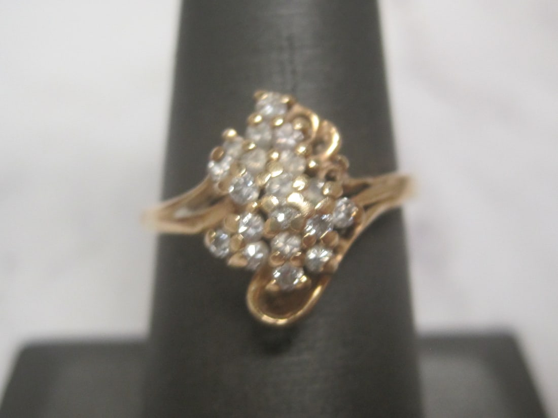 14k Gold Diamond Cluster Ring: Weighs 3.5 grams, Size 7 1/2