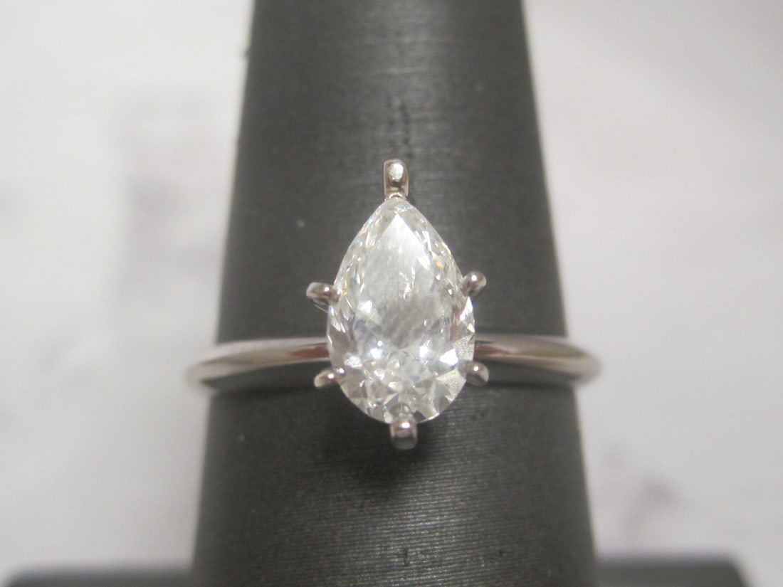 14k White Gold 1 Carat Pear Shaped Solitaire Diamond Ring: Weighs 2.4 grams, Size 7 3/4, GIA Graded- Color H, Clarity Sl1, See Report photo for specs., Purchased in 2020 for $5000