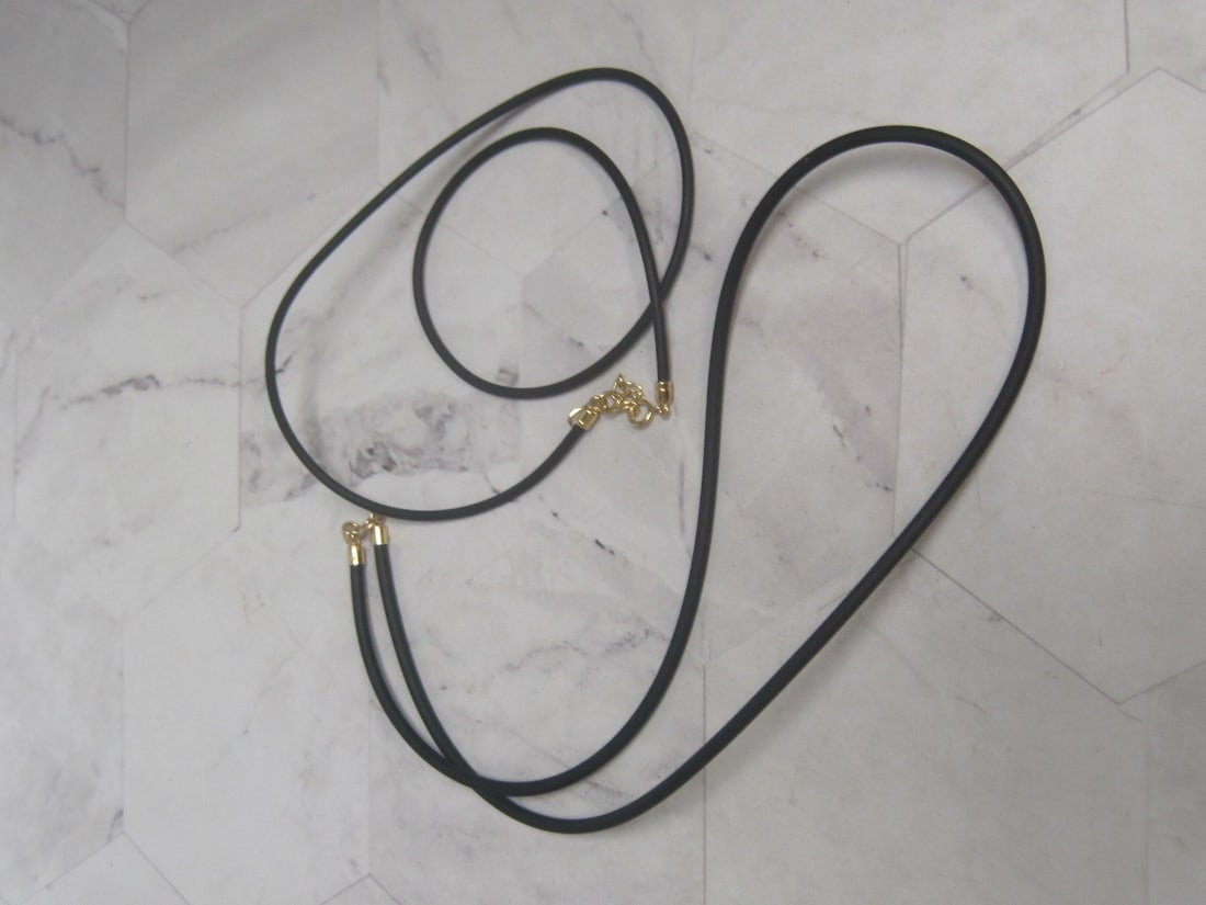Lot of 2 Black Cord Necklaces: One with a 14k gold clasp & one with 18k gold clasp