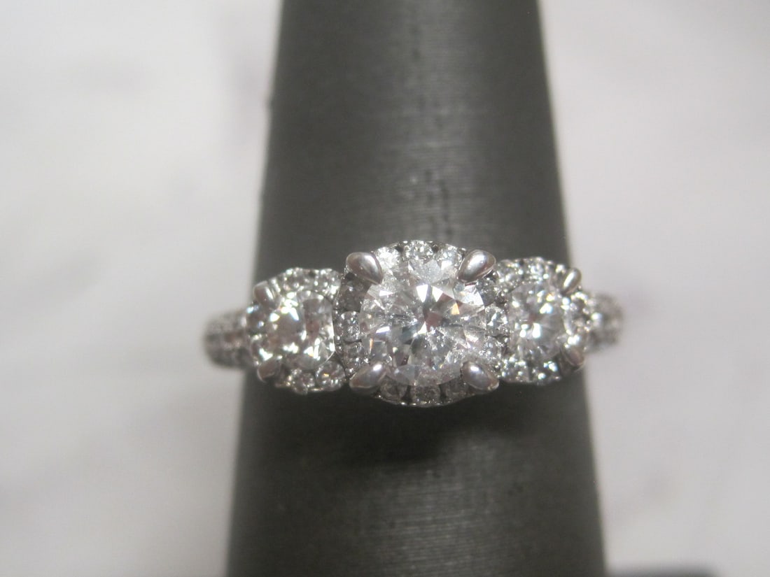 14k White Gold Diamond Ring appraised at $2,350: Size 6 3/4, 56 round diamonds totaling 1 carat, stunning, with appraisal of $2,350