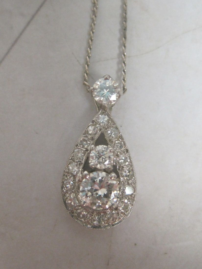 Antique 14k White Gold Diamond Pendant on 16" 14k White Gold Chain appraised at $2,450: 19 diamonds totaling 0.85 carat on 16" chain, With appraisal of $2,450