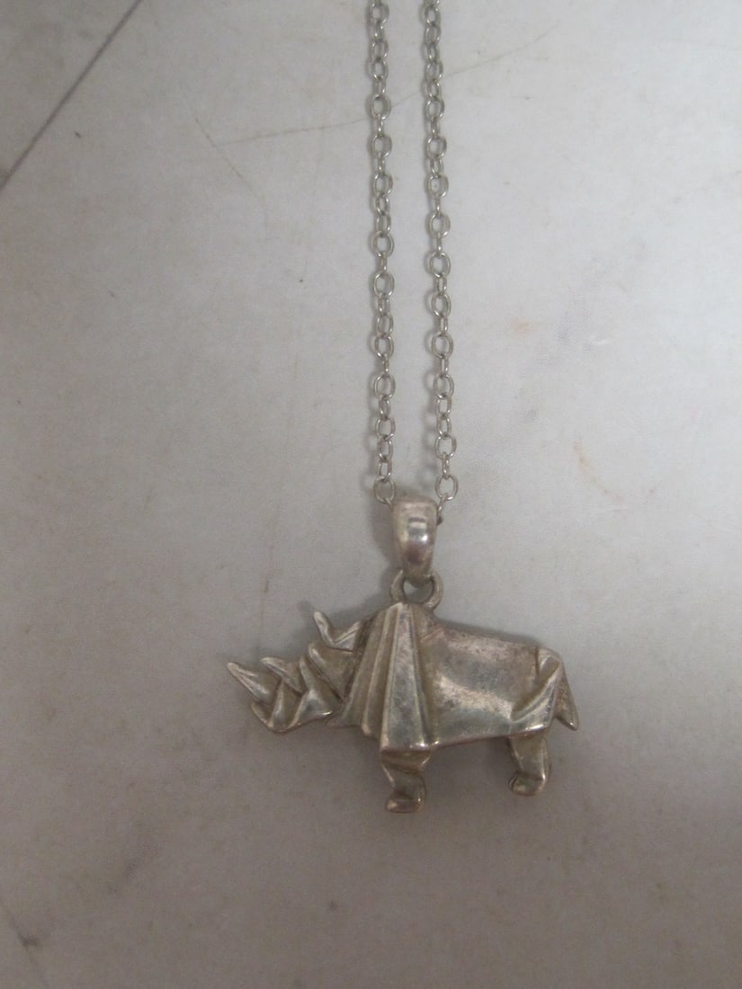 Sterling Silver Rhino Pendant on 18" Sterling Silver Chain: Weighs 3.5 grams