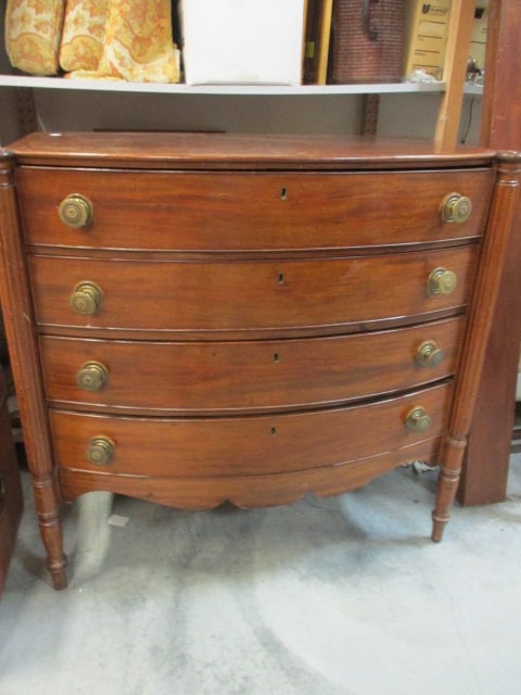 Vintage Federal Style Mahogany Bow Front Chest: Turned Reeded Corner Posts, Brass Rosette Pulls, Four Dovetail Drawers, 40 1/2" x 20 1/2" x 39", some scratches, stains and veneer chips, Local Pickup Only