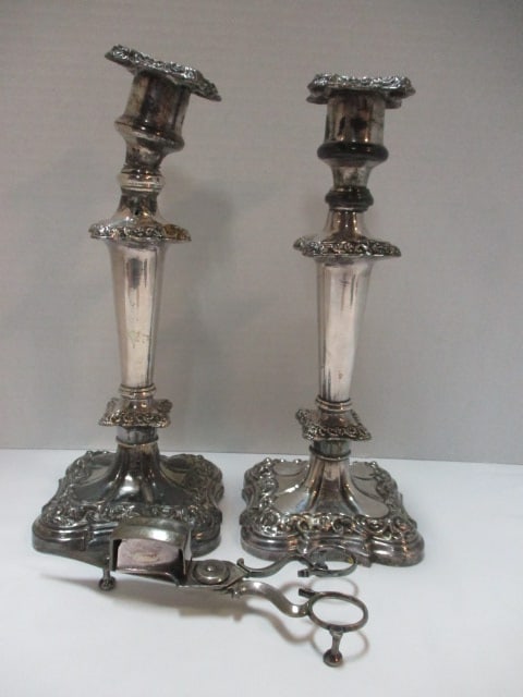 Pair of Silverplated Candlestick and Wick Scissors: Candle sticks 10 3/4"h, wick scissors 6 3/4" long, one candle stick top is loose-see pictures and preview for condition
