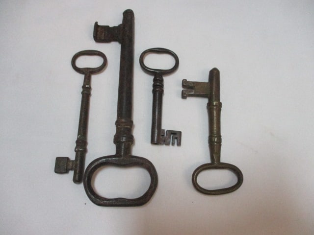 Four Old Cast Iron Skelton Keys: .