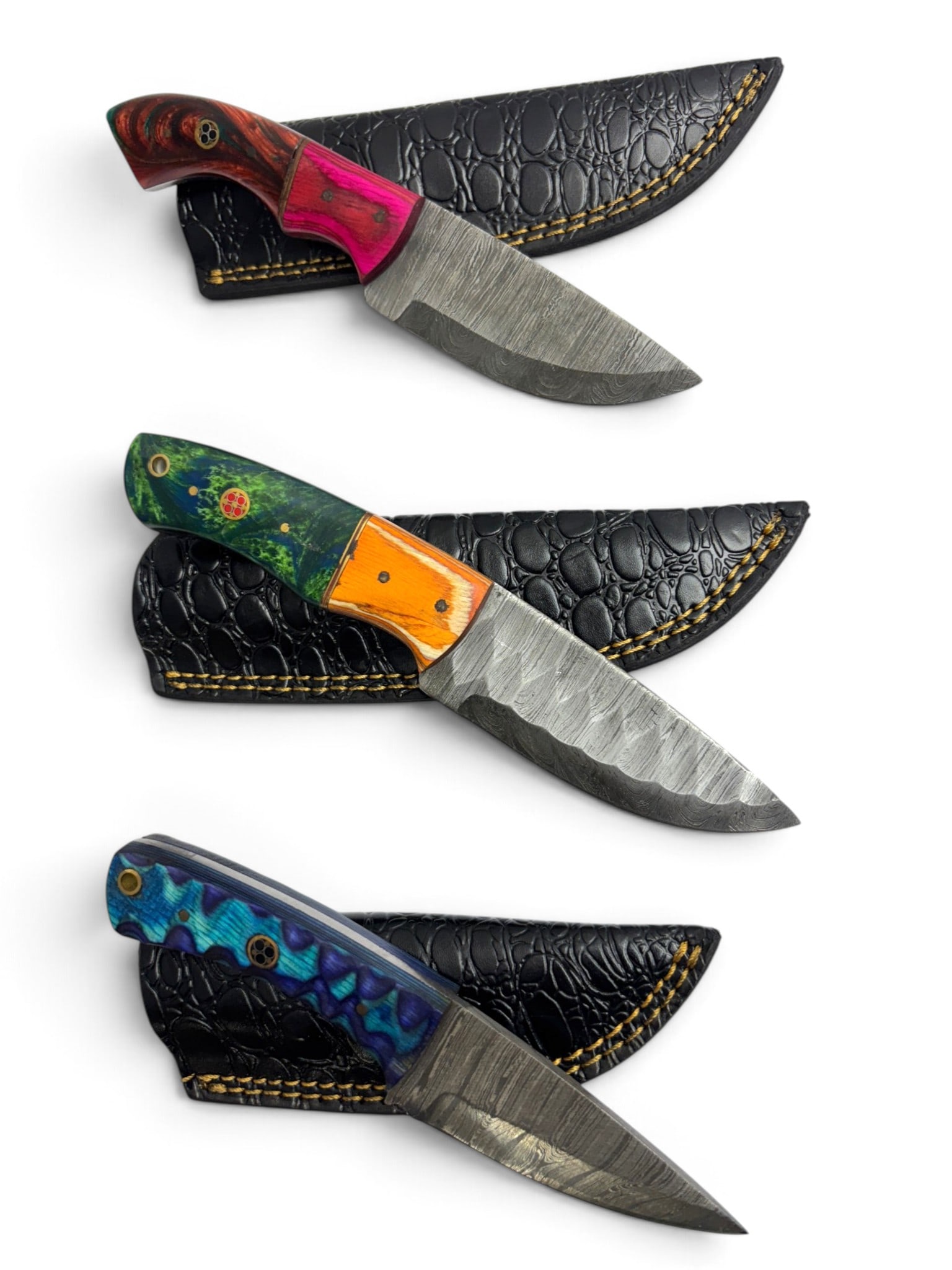 (3) Handmade Damascus Steel Knives with Custom Wood/Resin Grips and Leather Sheathe: Handmade Damascus Steel Knives with Custom Wood, Bone, Horn, or Resin handles. The Blade on these knives is a combination of 1095 HC Steel 15N20 Nickel Carbon Steel. The Laminate Bar is then folded