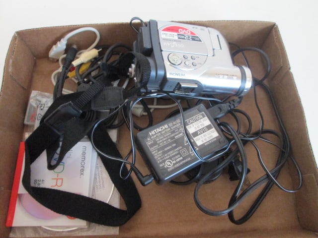 Hitachi Ultravision DVDCAM Digital Recorder/Camera: has two recording discs, battery charger, remotes, transfer cables and DVD instructional software. Charges and powered on