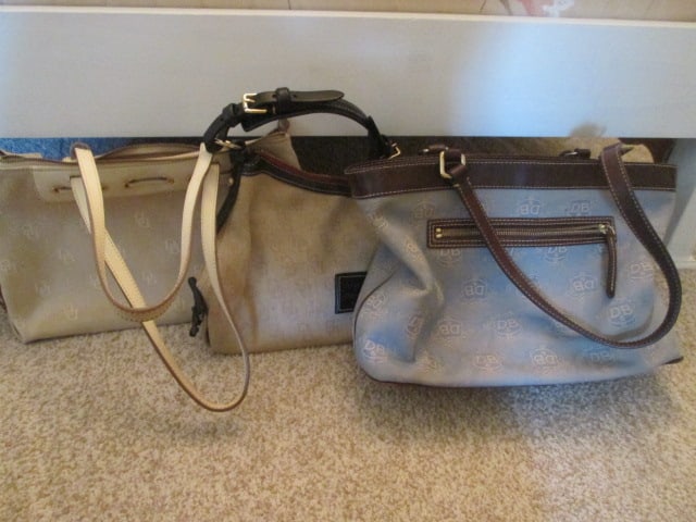 Three Dooney & Bourke Monogram Canvas Purses: Light blue purse includes utility bag, purses unauthenticated see pictures and preview to make own determination, normal use wear