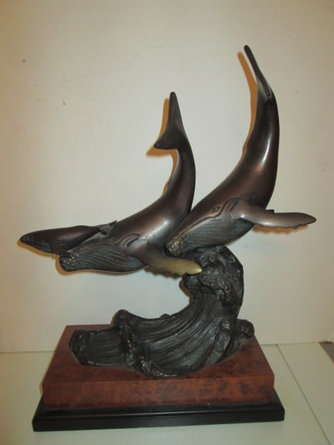 Bronze Humpback Whale Family Sculpture Mounted on Faux Burlwood and Black Plinth Base: 15 3/4"h, base measures 10 3/4" x 5 1/2"